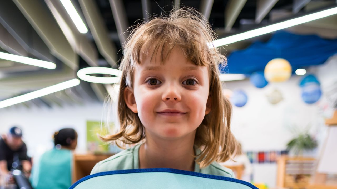 Kindergarten student in their classroom Kindergarten student in their classroom