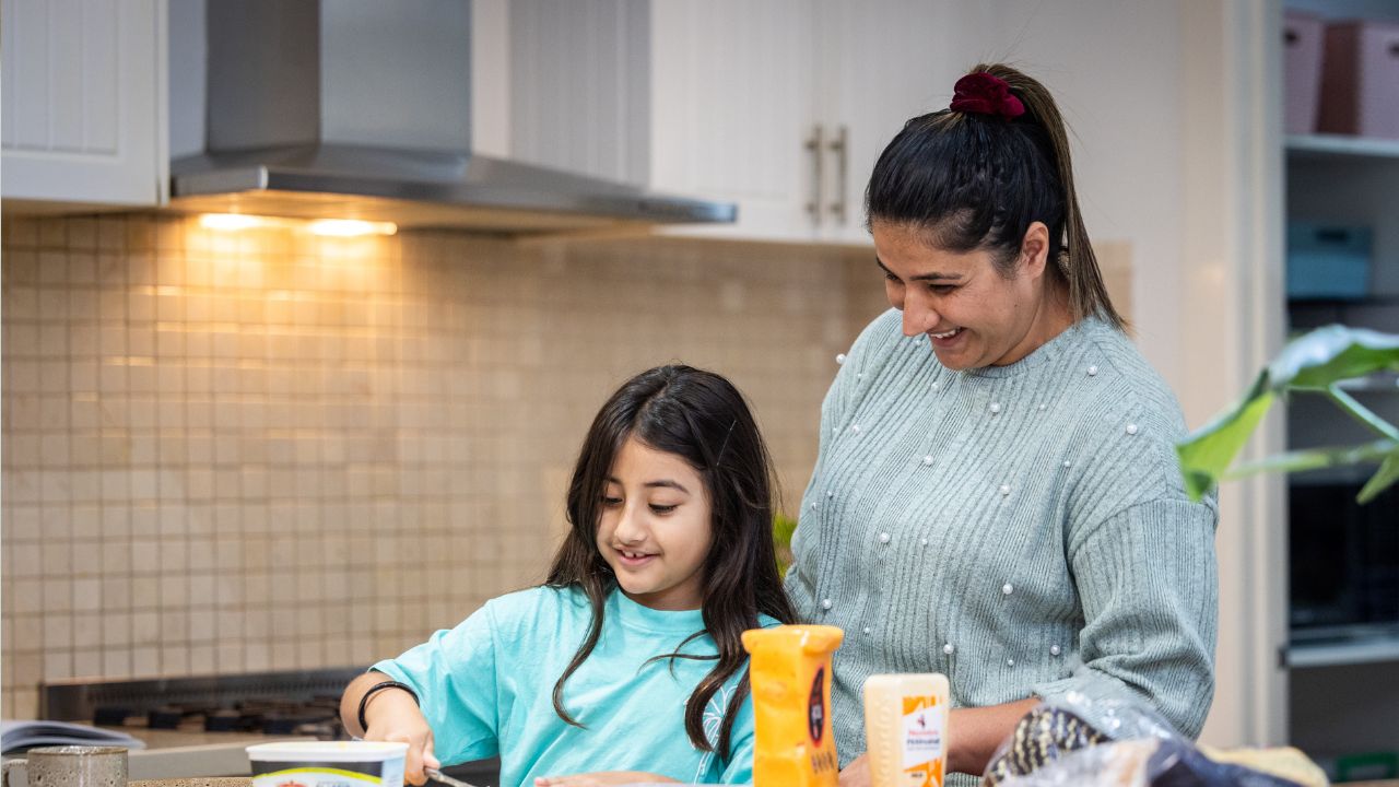 Mother and daughter in the family kitchen