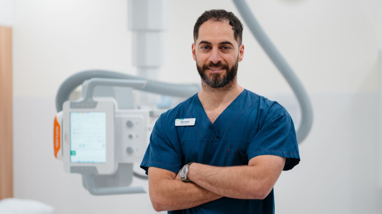 Healthcare professional standing in a hospital setting